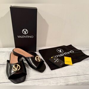 VALENTINO by Mario Valentino Armonia Slide
Black Sandal (Women)/size 6